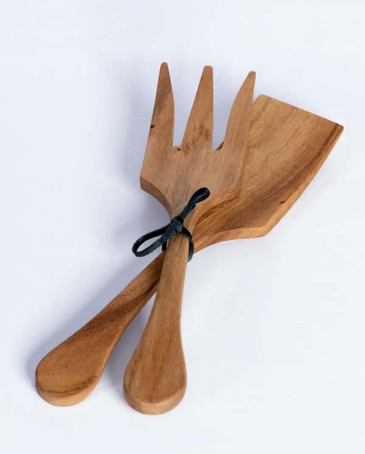 Wooden salad utensils tied together